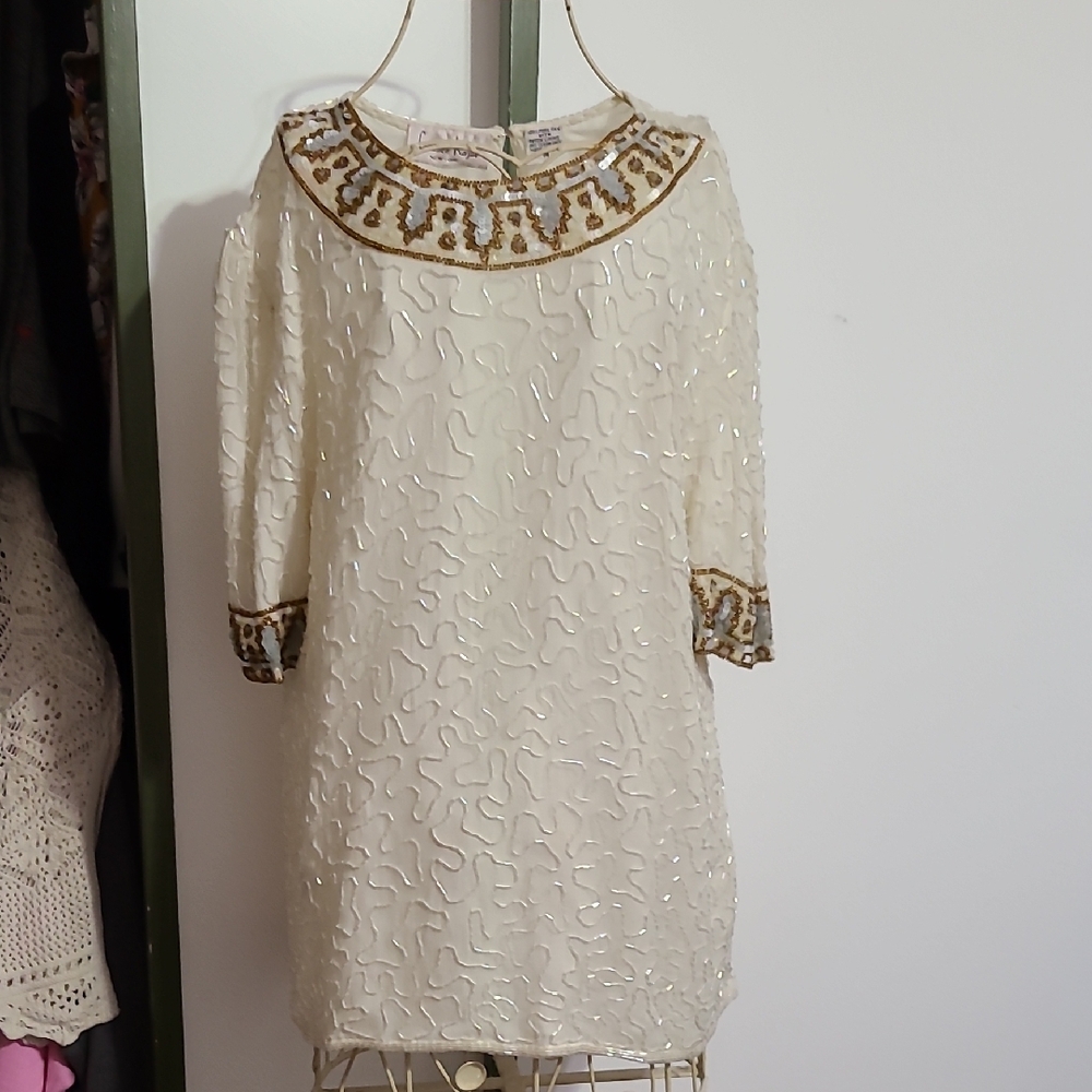 Elegant Cream Dress with Gold Accents